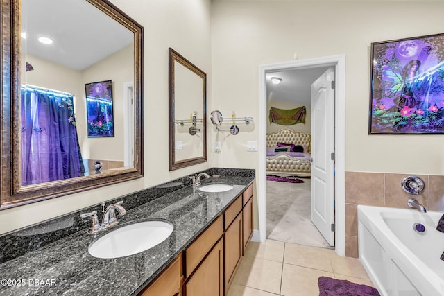19343 Moorgate St, Orlando, FL 32833 - bathroom with tile patterned flooring, a bath, and double vanity