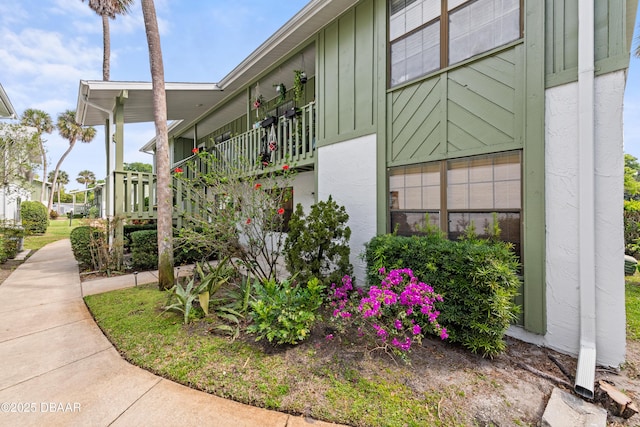 840 Center Ave Unit 21, Holly Hill, FL 32117 - view of property exterior featuring board and batten siding
