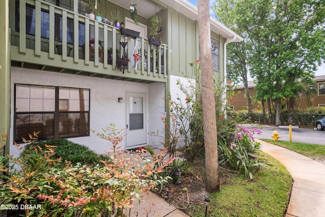 840 Center Ave Unit 21, Holly Hill, FL 32117 - property entrance with stucco siding