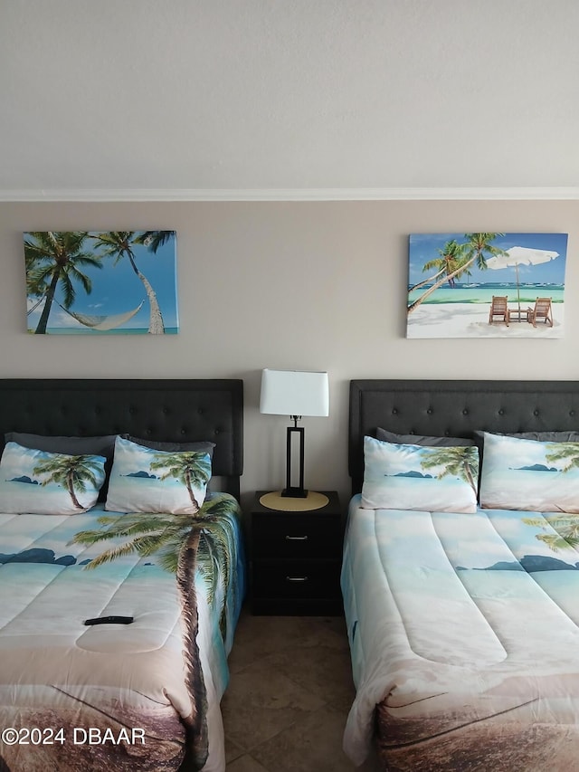 bedroom with ornamental molding