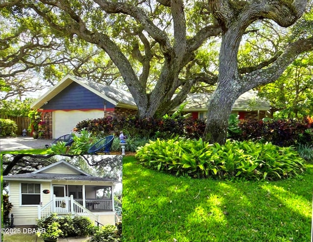 view of yard featuring covered porch