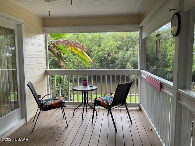 deck featuring a ceiling fan