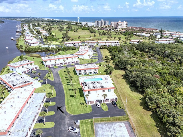 bird's eye view with a water view