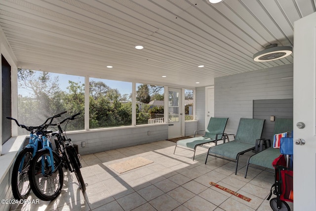 sunroom featuring a healthy amount of sunlight