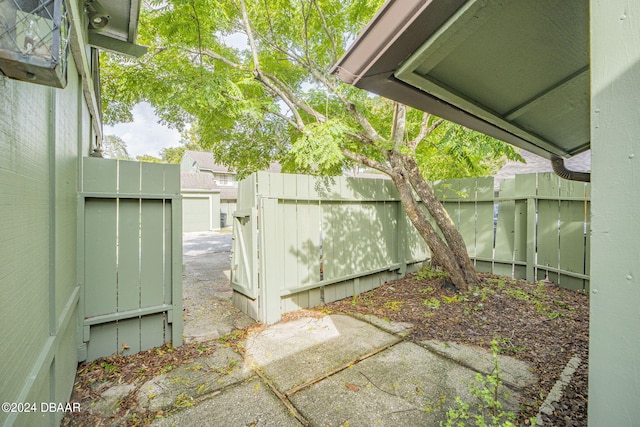 view of patio / terrace featuring a shed