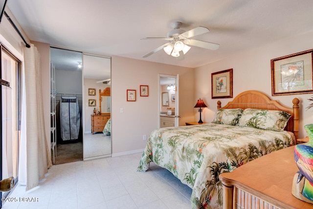 122 Cedar Dunes Dr, New Smyrna Beach, FL 32169 - bedroom featuring light tile patterned floors and a ceiling fan