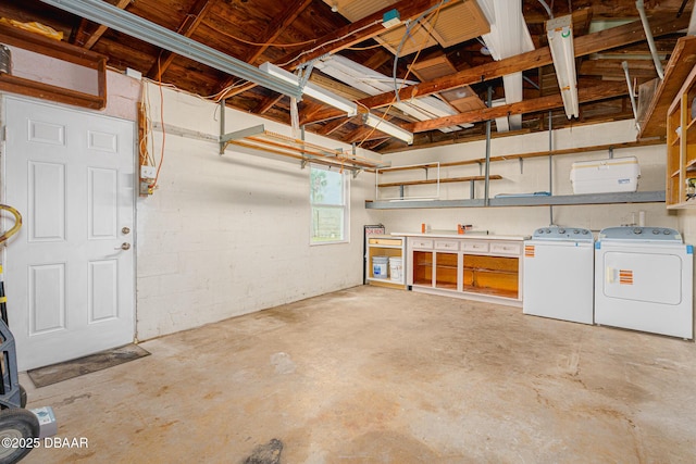 garage featuring washer and dryer