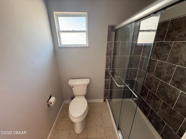 137 Beau Rivage Dr, Ormond Beach, FL 32176 - full bathroom featuring healthy amount of natural light, toilet, baseboards, and tile patterned floors