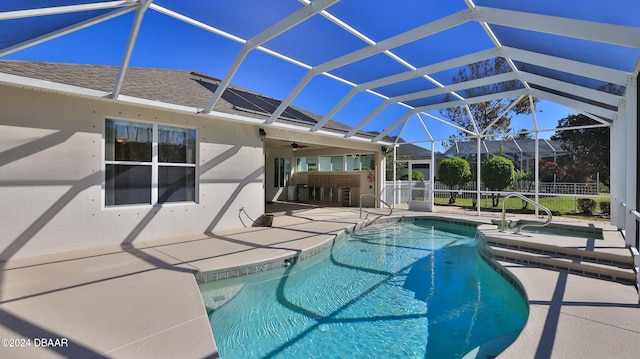 view of pool featuring a patio area and an outdoor bar