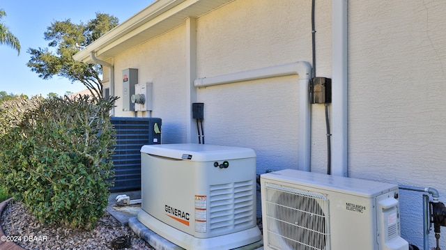 exterior details featuring ac unit and central AC unit