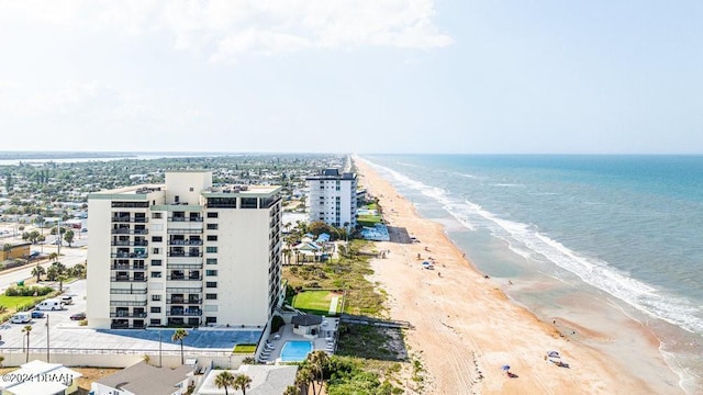 bird's eye view with a view of the beach and a water view