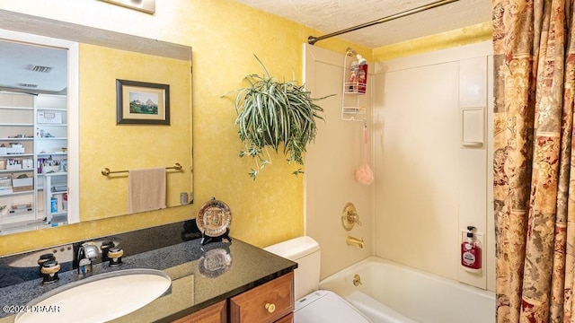 full bathroom with a textured ceiling, vanity, toilet, and shower / bathtub combination with curtain