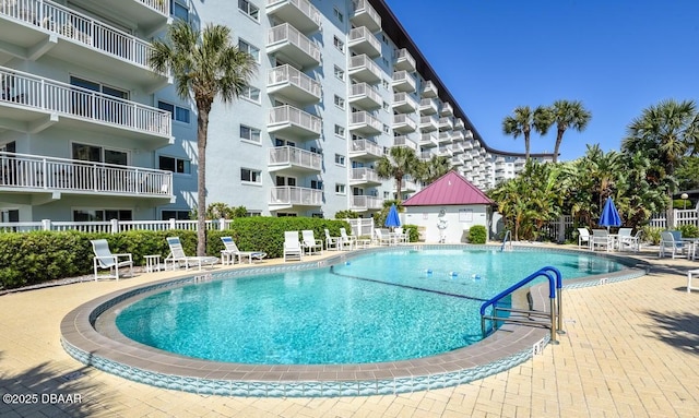 view of pool featuring a patio