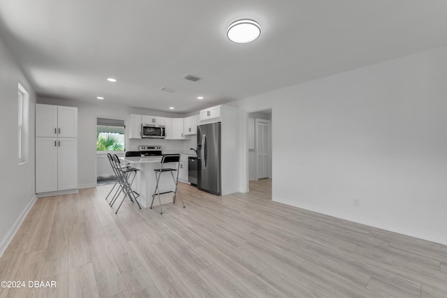 dining area featuring light hardwood / wood-style floors