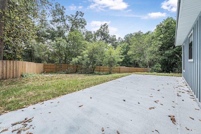 5620 Ridgewood Ave, Deleon Springs, FL 32130 - deck with a fenced backyard, a patio, and a yard