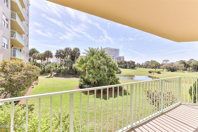 balcony featuring a water view