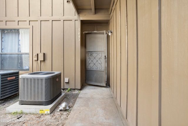 details featuring cooling unit and concrete flooring