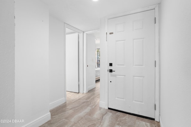 hallway featuring light hardwood / wood-style flooring