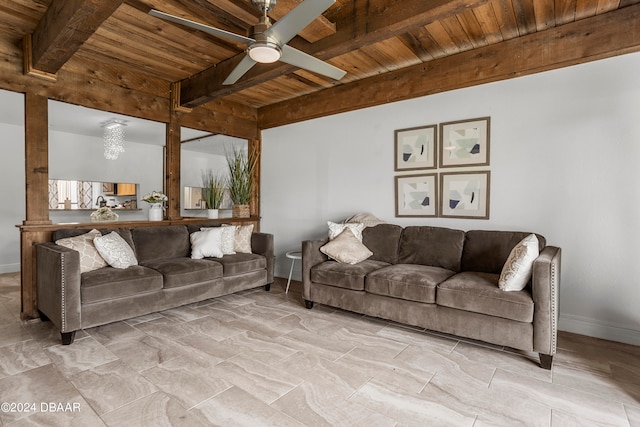 living room with beamed ceiling, ceiling fan, and wooden ceiling