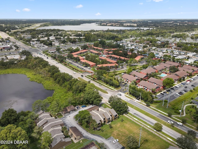 drone / aerial view with a water view