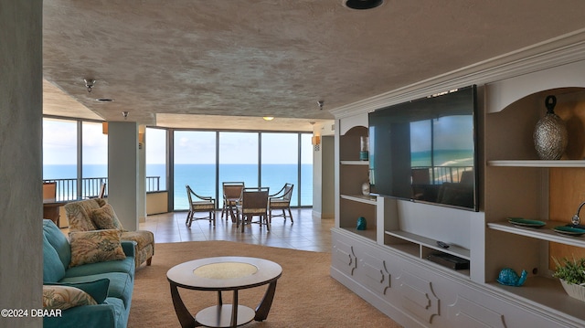 tiled living room with a wealth of natural light and floor to ceiling windows