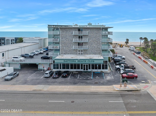 800 N Atlantic Ave Unit 523, Daytona Beach, FL 32118 - view of property featuring uncovered parking and a water view