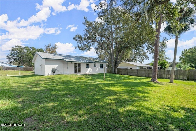 exterior space with a lawn