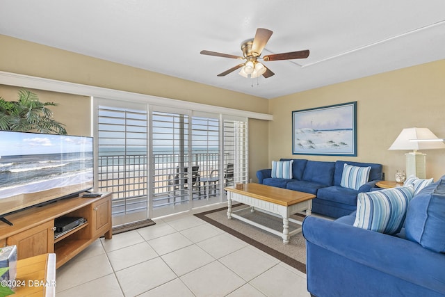815 Ocean Shore Blvd Unit U1B, Ormond Beach, FL 32176 - living room featuring a ceiling fan and light tile patterned floors