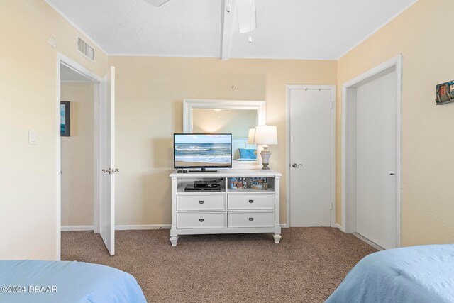 bedroom with light carpet and ceiling fan