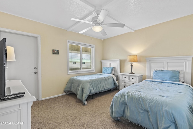 815 Ocean Shore Blvd Unit U1B, Ormond Beach, FL 32176 - carpeted bedroom featuring ceiling fan, baseboards, and a textured ceiling