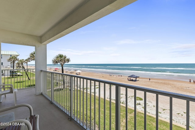 815 Ocean Shore Blvd Unit U1B, Ormond Beach, FL 32176 - balcony featuring view of water and beach