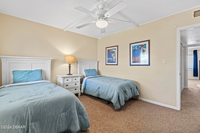 bedroom featuring ceiling fan and light colored carpet