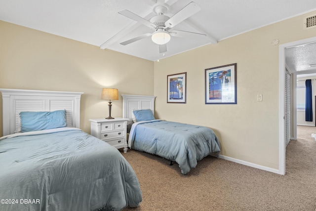 815 Ocean Shore Blvd Unit U1B, Ormond Beach, FL 32176 - carpeted bedroom featuring baseboards and ceiling fan