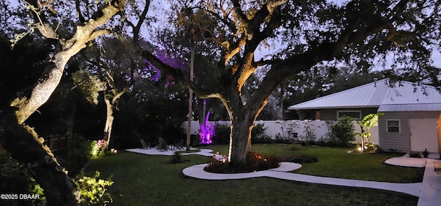 view of yard featuring a patio and fence