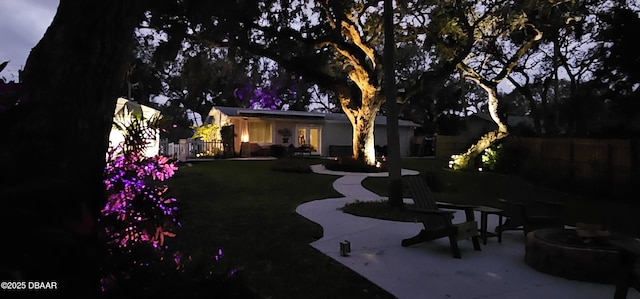 view of yard featuring a patio and fence