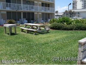 view of community featuring a yard