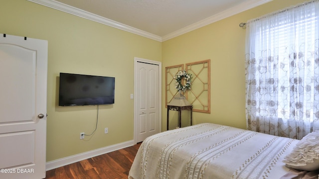 3368 Marsili Ave, New Smyrna Beach, FL 32168 - bedroom with dark wood-style floors, crown molding, and a closet