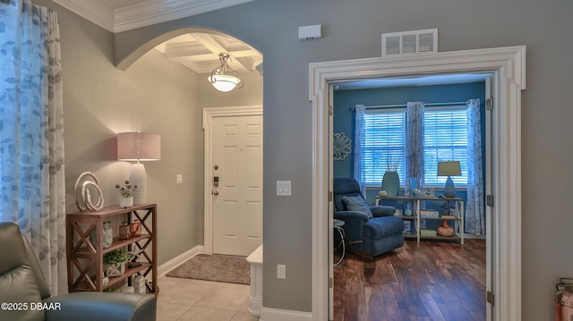 3368 Marsili Ave, New Smyrna Beach, FL 32168 - entrance foyer featuring arched walkways and ornamental molding