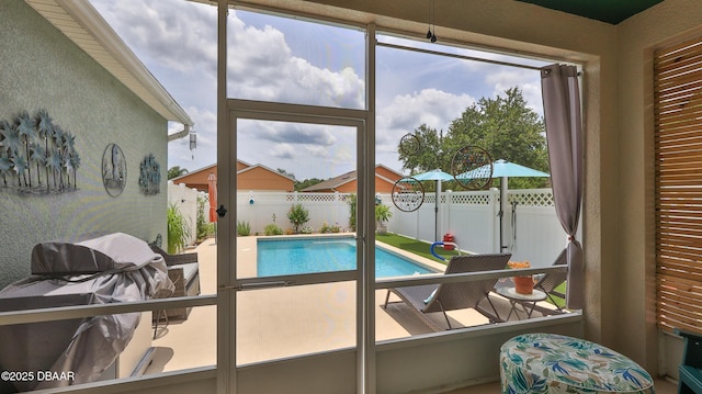 3368 Marsili Ave, New Smyrna Beach, FL 32168 - view of pool featuring a fenced backyard, area for grilling, and a patio