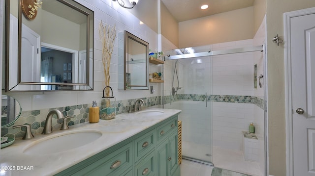 3368 Marsili Ave, New Smyrna Beach, FL 32168 - bathroom featuring a stall shower and double vanity