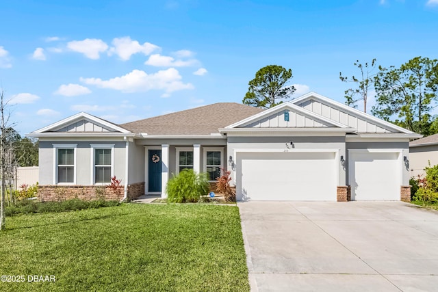 view of front of home with board and batten siding, a front yard, concrete driveway, and an attached garage