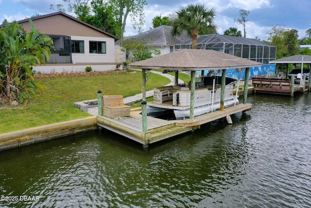 view of dock with a yard, a water view, and boat lift