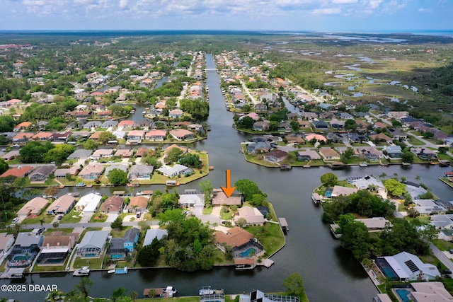 aerial view featuring a residential view and a water view