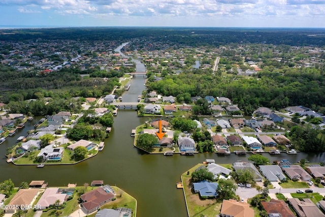 bird's eye view with a water view and a residential view