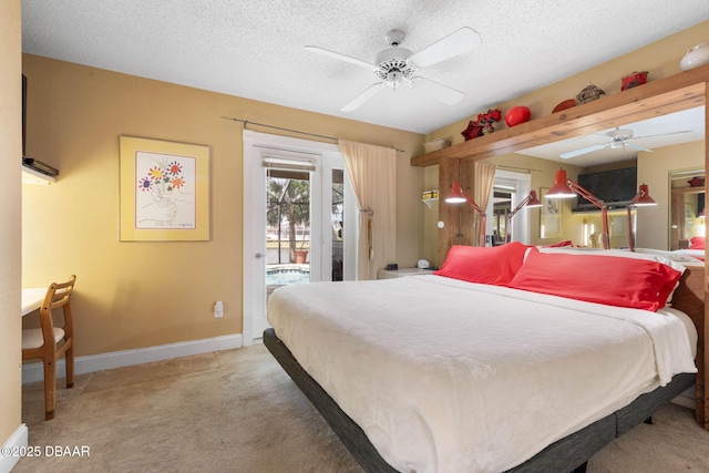 bedroom with access to outside, baseboards, a textured ceiling, and carpet floors