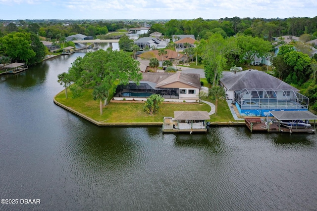 bird's eye view featuring a residential view and a water view
