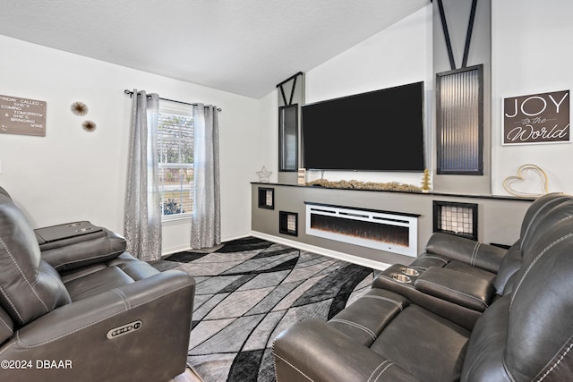 living room featuring carpet and vaulted ceiling