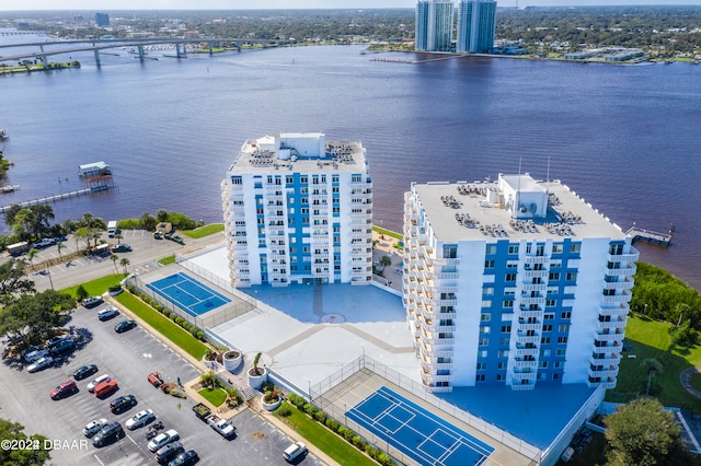 birds eye view of property with a water view