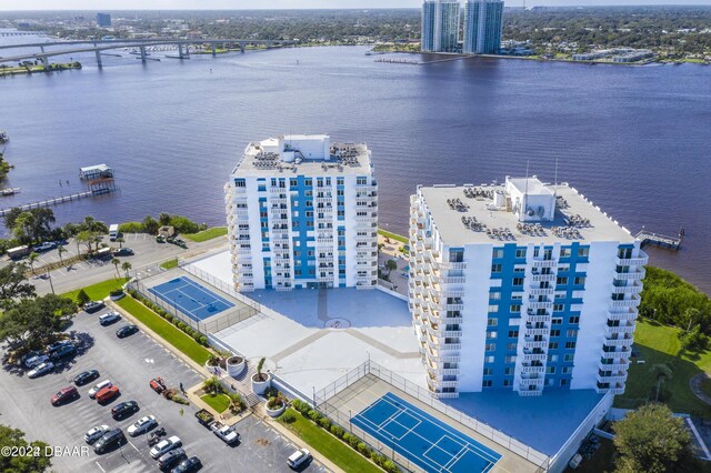 935 N Halifax Ave Unit 907, Daytona Beach, FL 32118 - drone / aerial view of a notable bridge, apartment complex / building, and a large body of water
