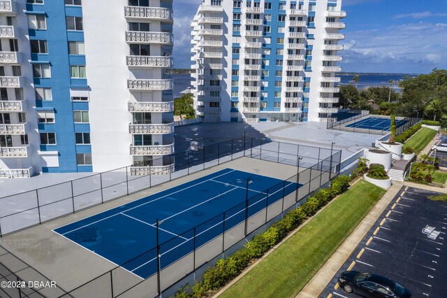 935 N Halifax Ave Unit 907, Daytona Beach, FL 32118 - view of tennis court featuring fence